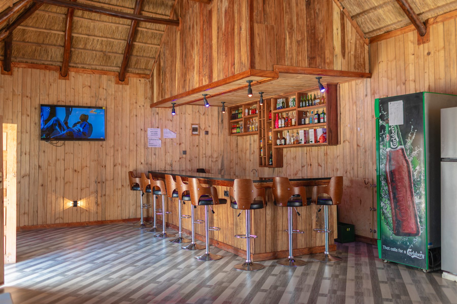 Wood-finished bar interior at ATM Comfort Zone